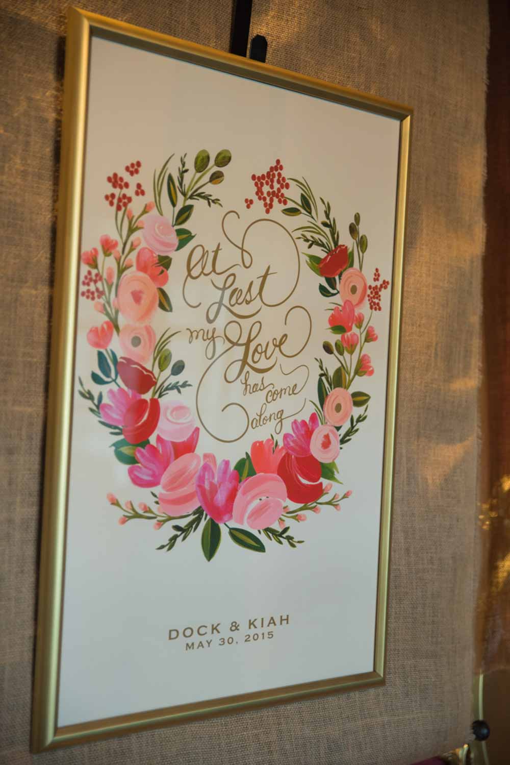 vibrant wedding welcome sign in gold frame