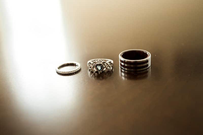wedding bands on table