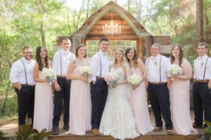bridal party in front of Bridle Oaks wedding ceremony space