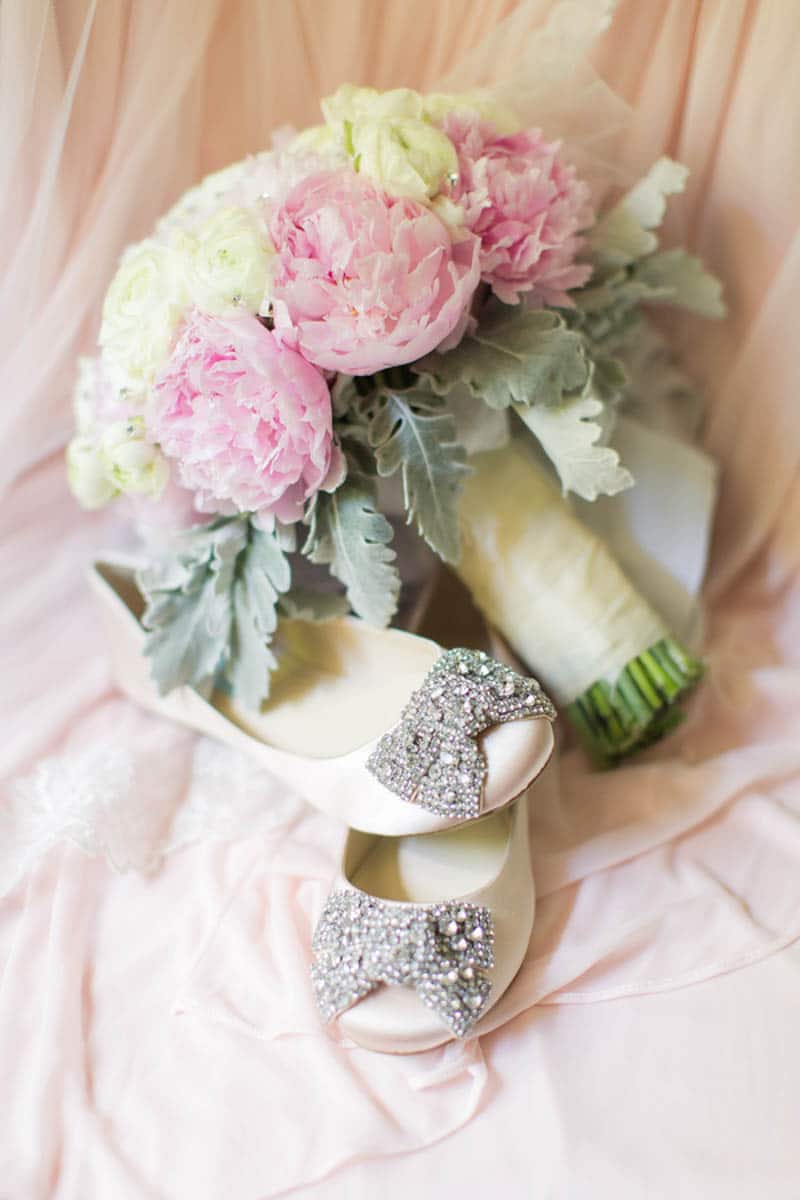 bridal flats with silver rhinestone bows of the toes