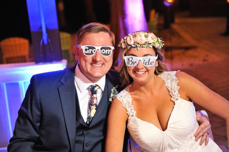 bride and groom with wedding sunglasses at Paradise Cove wedding reception