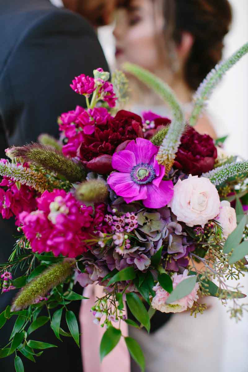 close up of a purple bridal bouquet