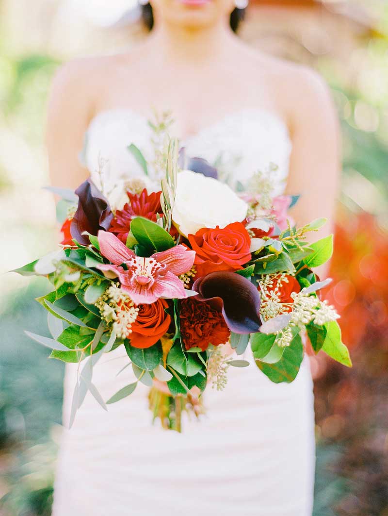 red orchid and purple calla lily bridal bouquet