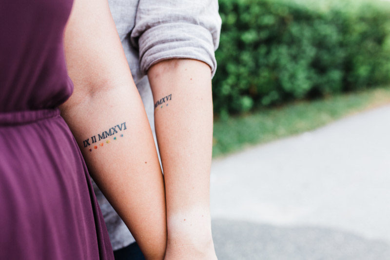 couple with matching tattoos for engagement session