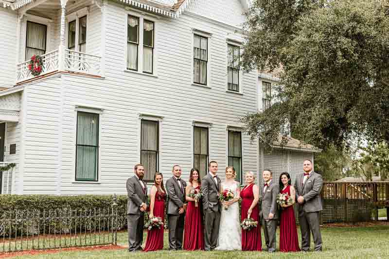wedding party standing in front of the Mote-Morris House for wedding