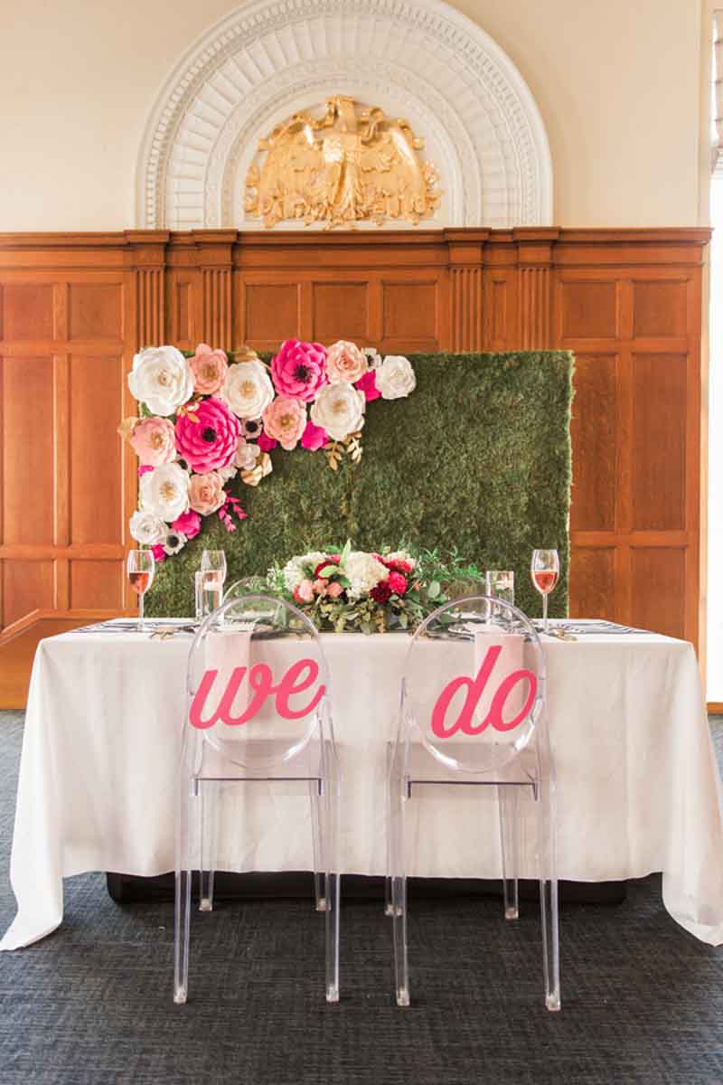 sweetheart table with ghost chairs