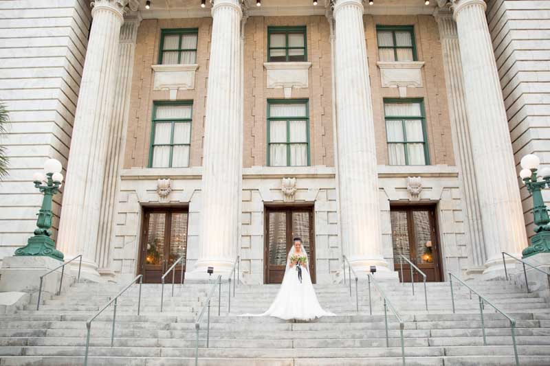 bride standing in front of Le Meridein Tampa