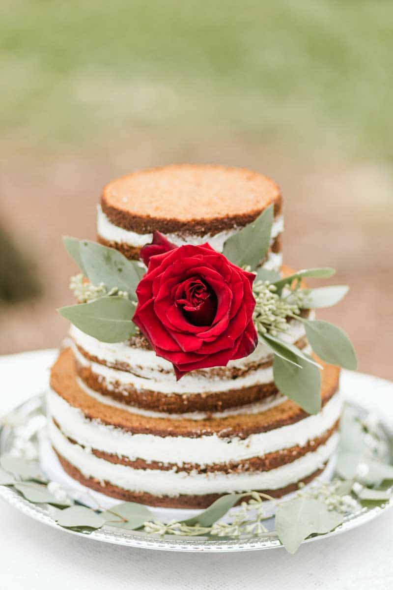 naked cake with red rose
