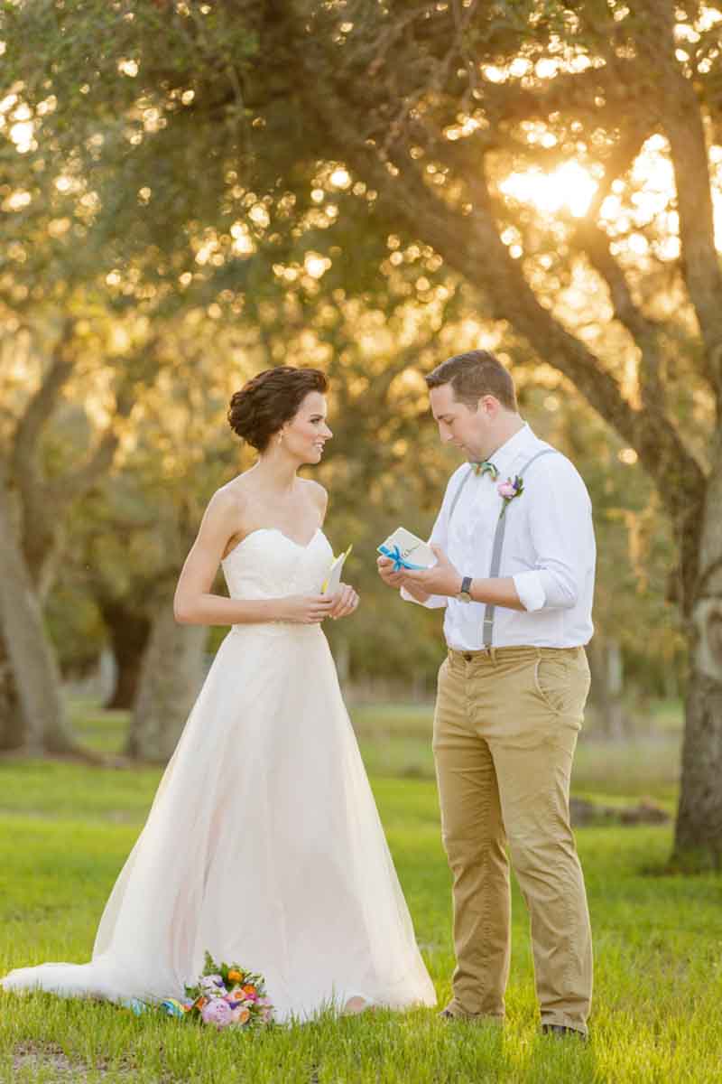 couple reading wedding vows