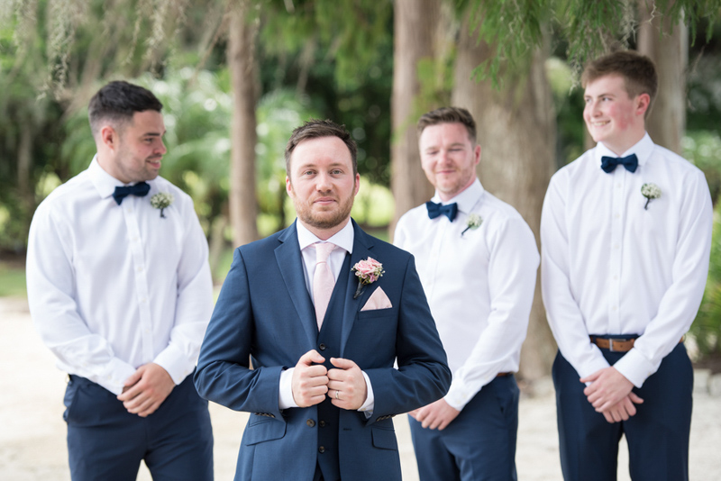 groom in blue suit for Paradise Cove wedding