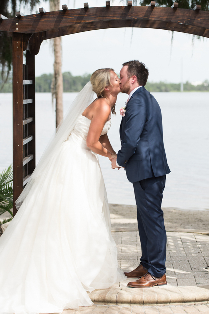 bride and groom's first kiss 