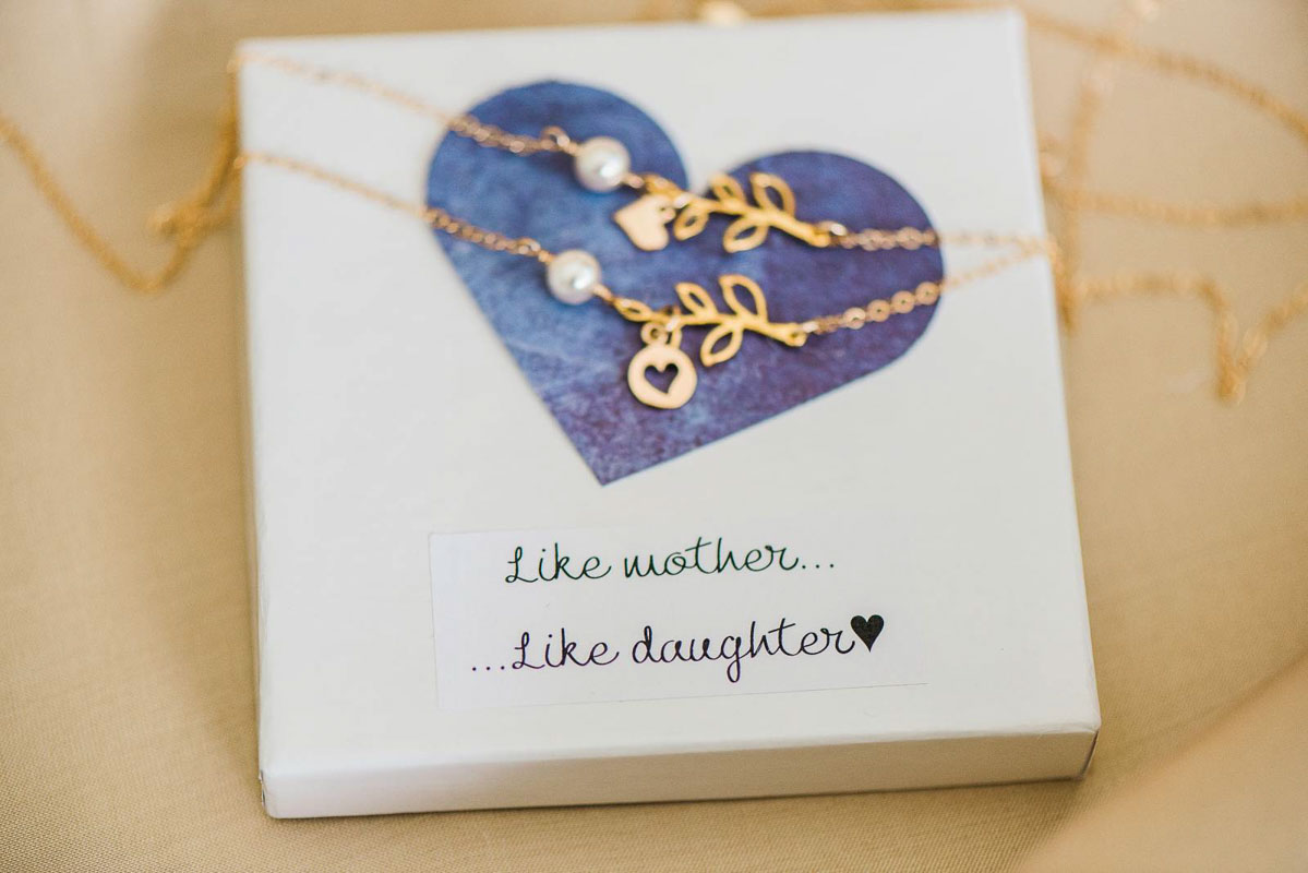 gold mother and daughter necklace with a like mother, like daughter note