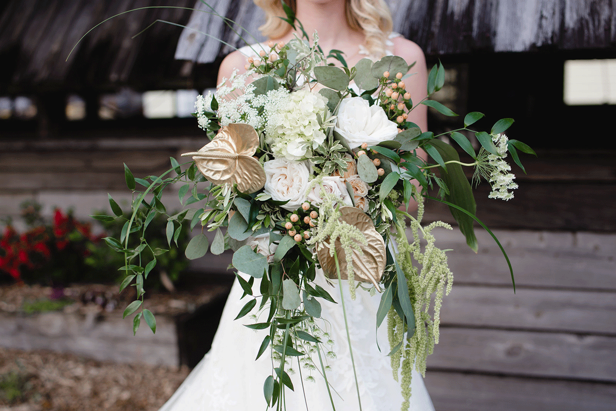 greenery, white, and gold wedding bouquet from Orlando wedding florist Events by The Flower Studio